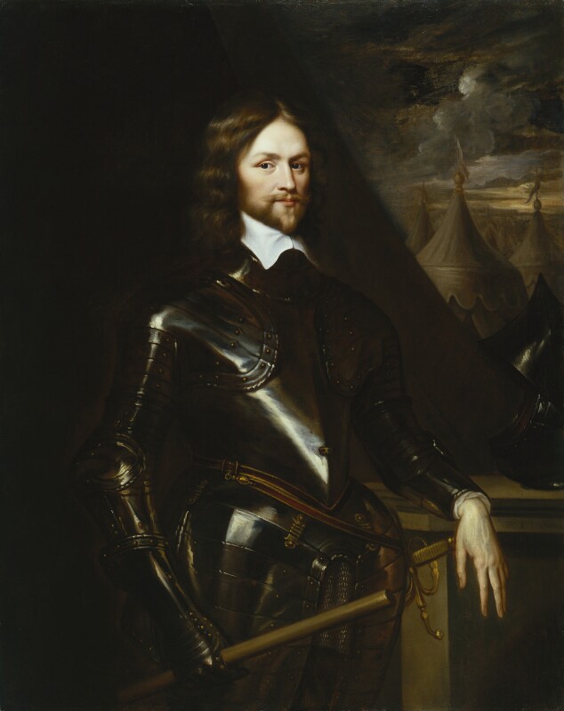 An oil portrait painting of Henry Ireton who is stood in front of a backdrop of military tents with his arm, with the gauntlet removed, resting on a table in which a helmet sits. Ireton is wearing armour including a gauntlet on his right hand. He has brown hair and a neat beard and moustache.